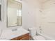 Clean bathroom featuring a shower and tub combination, a sink, and a toilet at 5529 W Virginia Ave, Phoenix, AZ 85035