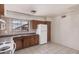 Bright kitchen with wood cabinets, offering a functional space for preparing meals at 5529 W Virginia Ave, Phoenix, AZ 85035