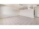 Spacious living room with tile flooring offers a clean and versatile living space at 5529 W Virginia Ave, Phoenix, AZ 85035