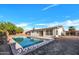Backyard pool and patio at 6038 E Hobart St, Mesa, AZ 85205