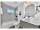 Updated bathroom featuring a vessel sink, walk-in shower and modern finishes at 6038 E Hobart St, Mesa, AZ 85205
