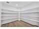 Organized pantry with ample shelving, providing plenty of storage space at 6038 E Hobart St, Mesa, AZ 85205