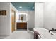 Stylish bathroom boasts a walk-in shower, a soaking tub, and a modern vanity with sleek fixtures at 6222 N 21St Dr, Phoenix, AZ 85015