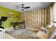 Bright home office with a fun accent wall, ceiling fan, and light natural light at 6222 N 21St Dr, Phoenix, AZ 85015