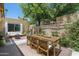 Inviting patio space with dining table, chairs, and serene outdoor ambiance at 6222 N 21St Dr, Phoenix, AZ 85015