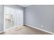 Bedroom with a large sliding glass door and wood look flooring at 6565 N 19Th Ave # 45, Phoenix, AZ 85015