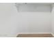 This walk-in closet provides a simple rod and shelf for organizing your wardrobe at 6565 N 19Th Ave # 45, Phoenix, AZ 85015