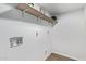 Dedicated laundry room features shelving for supplies and easy hookups at 6565 N 19Th Ave # 45, Phoenix, AZ 85015