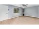 Bright living room with a ceiling fan, nice flooring and plenty of natural light at 6565 N 19Th Ave # 45, Phoenix, AZ 85015
