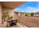 Enjoy the outdoors from this inviting covered patio with furniture and privacy screen at 6565 N 19Th Ave # 45, Phoenix, AZ 85015