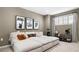 Cozy living room with plush sectional seating, movie posters, and stylish decor for a relaxing atmosphere at 7404 W Buckhorn Trl, Peoria, AZ 85383
