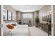 Inviting living room featuring a comfortable sectional sofa, modern decor, and stylish entertainment setup at 7404 W Buckhorn Trl, Peoria, AZ 85383