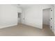 Spacious and bright bedroom with neutral carpet, ready for your personal touch and decor at 7430 S 75Th Dr, Laveen, AZ 85339