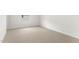 Empty bedroom featuring neutral carpet and a window for natural light, awaiting personal touches at 7430 S 75Th Dr, Laveen, AZ 85339