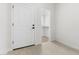 Bright entryway featuring a closet and a white door, with tile flooring and neutral walls at 7430 S 75Th Dr, Laveen, AZ 85339