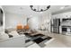 Bright, open living space featuring modern furnishings, a dining area, and a well-equipped kitchen at 7430 S 75Th Dr, Laveen, AZ 85339