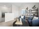 Bright and airy sitting room with comfortable seating and stylish decor, perfect for relaxation at 7437 S 75Th Dr, Laveen, AZ 85339
