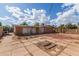 Expansive backyard with block wall, landscaping potential, and convenient access to the home at 8033 N 56Th Ave, Glendale, AZ 85302