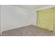 Clean, bright bedroom featuring modern wood-look tile flooring and neutral wall color, great for relaxation at 8033 N 56Th Ave, Glendale, AZ 85302