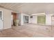 Spacious covered patio with tiled floor and white brick walls offering an outdoor living area at 8033 N 56Th Ave, Glendale, AZ 85302