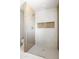 Modern bathroom featuring a walk-in shower with a glass enclosure at 8334 E Palm Ln, Scottsdale, AZ 85257