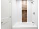 Modern bathroom featuring a white tub and shower with stylish tile accents at 8334 E Palm Ln, Scottsdale, AZ 85257