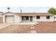 Charming single-story home featuring a well-maintained front yard and inviting entrance at 8334 E Palm Ln, Scottsdale, AZ 85257