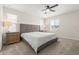 Bright bedroom with a neutral color palette, carpet, and a ceiling fan at 8343 E Irwin Ave, Mesa, AZ 85209