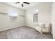 Spare bedroom with a rug, natural light, and a neutral color palette at 8343 E Irwin Ave, Mesa, AZ 85209