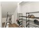 A white storage closet with a shoe rack is designed to keep your personal belongings neat and organized at 8343 E Irwin Ave, Mesa, AZ 85209