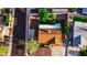 Aerial view of a home showcasing a well-maintained roof, landscaping, and surrounding neighborhood at 919 W Lodge Dr, Tempe, AZ 85283