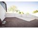 Low maintenance backyard features gravel landscaping and a concrete slab at 919 W Lodge Dr, Tempe, AZ 85283