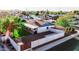 This house has large yard, desert landscaping, brick accents, and an inviting front facade at 919 W Lodge Dr, Tempe, AZ 85283