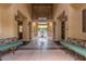 The entrance area features comfortable benches, welcoming guests to relax and socialize at 9820 N Central Ave # 224, Phoenix, AZ 85020