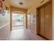 Hallway with a balcony view, elevator, and neutral color scheme at 9820 N Central Ave # 224, Phoenix, AZ 85020