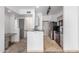 Open-concept kitchen with sleek appliances and a view into the living area at 9820 N Central Ave # 224, Phoenix, AZ 85020