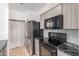 Well-equipped kitchen with stainless steel appliances and modern cabinets at 9820 N Central Ave # 224, Phoenix, AZ 85020