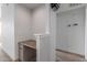 A clean landing area with a small desk perfect for a home office at 9820 N Central Ave # 224, Phoenix, AZ 85020