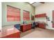 A spacious office provides a quiet and productive workspace with ample desk and storage at 9820 N Central Ave # 224, Phoenix, AZ 85020