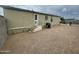 Home with gravel backyard, patio and grill at 10231 E Illini St, Mesa, AZ 85208