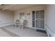 Inviting front porch with seating, providing a cozy entrance to the home at 11012 E Knowles Ave, Mesa, AZ 85209