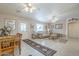 Comfortable living area adjacent to dining space, perfect for Gathering gatherings at 11012 E Knowles Ave, Mesa, AZ 85209