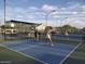This community features pickleball courts and outdoor seating for residents to enjoy at 11012 E Knowles Ave, Mesa, AZ 85209