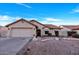Charming single-story home featuring a tile roof, desert landscaping and a two car garage at 1142 E Encinas Ave, Gilbert, AZ 85234