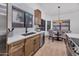 Bright kitchen with stainless steel appliances, light countertops, and wooden cabinets at 1142 E Encinas Ave, Gilbert, AZ 85234