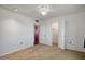 Bright carpeted bedroom with walk in closet with folding doors at 13632 N Silverbell Dr, Sun City, AZ 85351