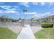 A brick sign and walkway lead into this well-maintained community with lush green lawns at 13632 N Silverbell Dr, Sun City, AZ 85351