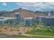 Modern urban condos near a waterfront walking path with a mountain backdrop provide city living at 140 E Rio Salado Pkwy # 402, Tempe, AZ 85281