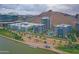 Expansive aerial view showcasing the condo community, Tempe Town Lake, and surrounding desert landscape at 140 E Rio Salado Pkwy # 402, Tempe, AZ 85281