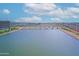 Lake view with bridge to city, mountain backdrop, and sunny skies. Tempe Town Lake at 140 E Rio Salado Pkwy # 402, Tempe, AZ 85281